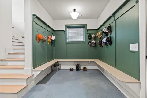 a view of a backyard with sitting area