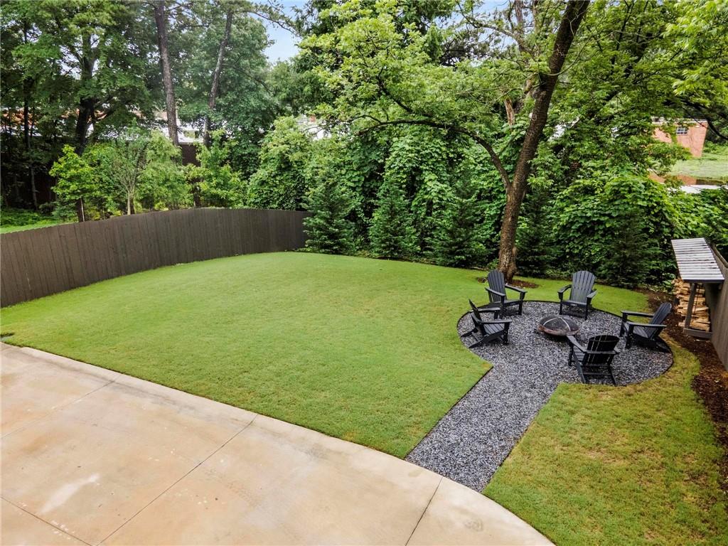 1412 Carroll Drive Northwest Atlanta, GA 30318 - Photo 38 of 42 a view of a backyard with sitting area