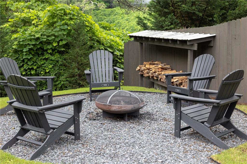 1412 Carroll Drive Northwest Atlanta, GA 30318 - Photo 40 of 42 a view of a wooden chairs and table in the patio
