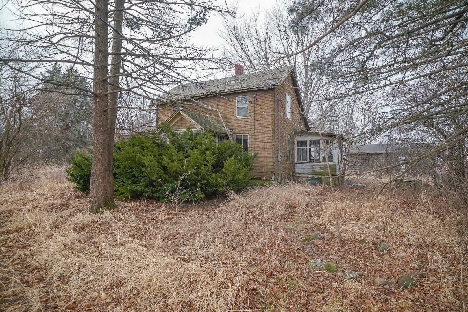 7900 South Mulford Road Rochelle, IL 61068 - Photo 8 of 12 a view of a house with a yard and plant