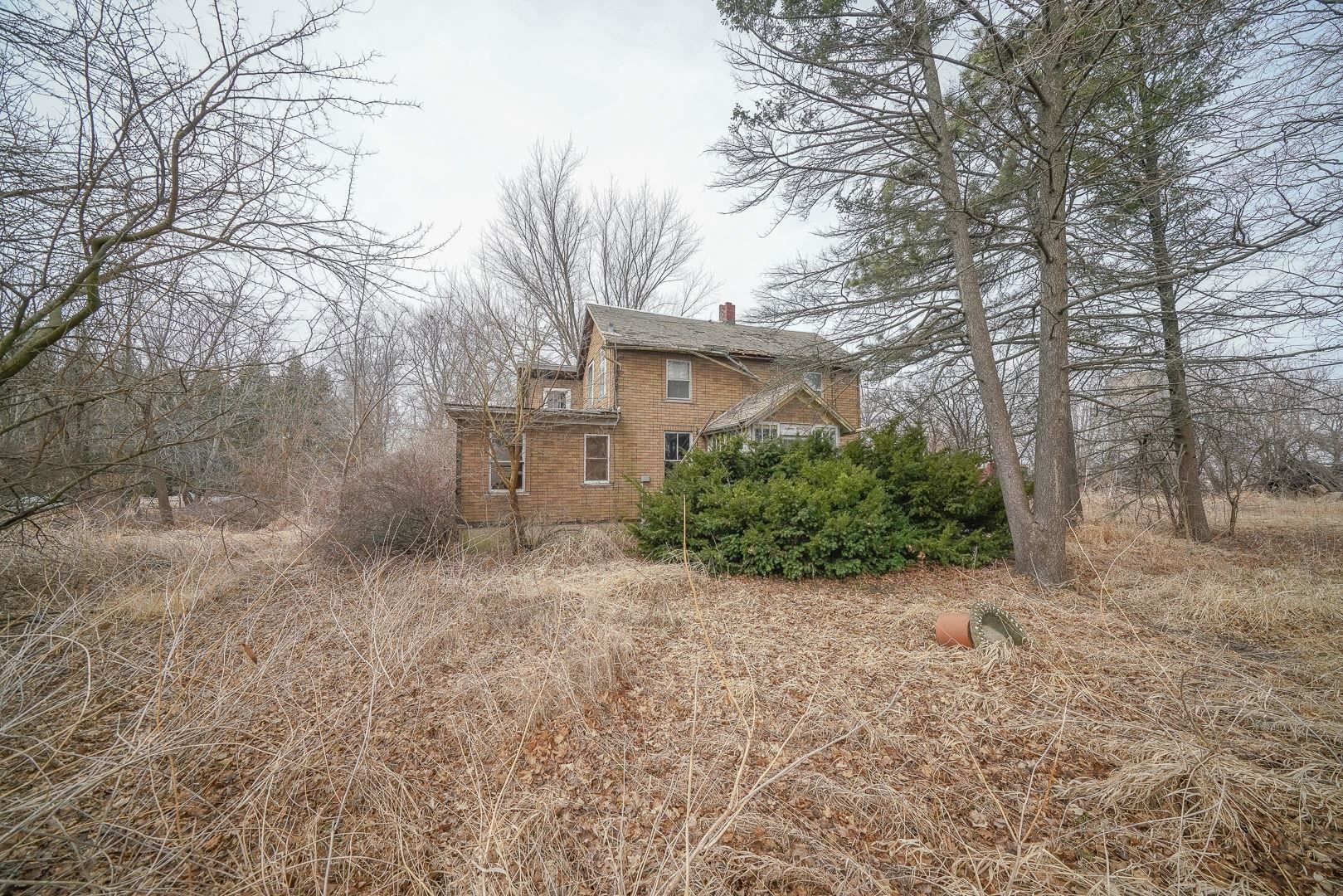7900 South Mulford Road Rochelle, IL 61068 - Photo 9 of 12 a view of a house with a yard