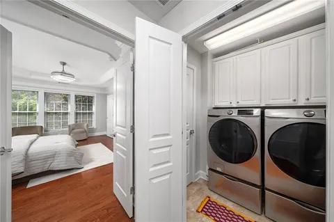 a view of a kitchen with washer and dryer