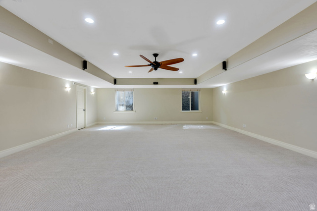 650 East Center Street Alpine, UT 84004 - Photo 24 of 38 Spacious room featuring neutral carpeting, recessed lighting, a ceiling fan with wood-finish blades, and built-in wall speakers, and radiant heat in floor