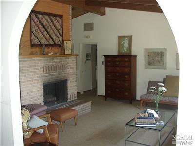 3663 Thorn Road Sebastopol, CA 95472 - Photo 3 of 7 a living room with furniture and a fireplace