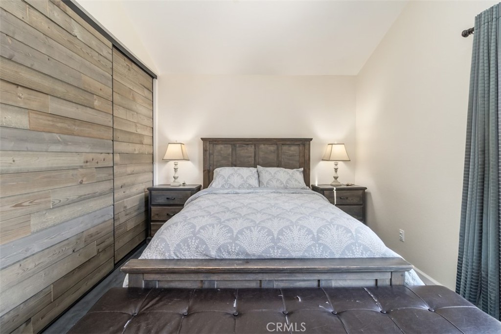 27432 Pinavete Mission Viejo, CA 92691 - Photo 18 of 37 a bedroom with a bed and wooden floor