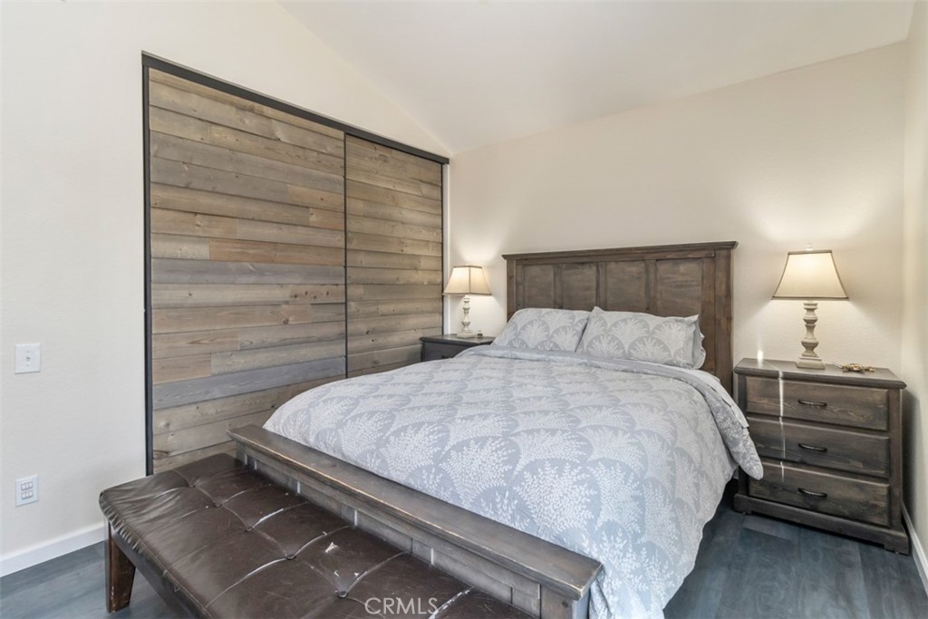 27432 Pinavete Mission Viejo, CA 92691 - Photo 19 of 37 a bedroom with a bed and a night stand