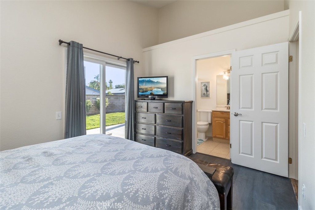 27432 Pinavete Mission Viejo, CA 92691 - Photo 21 of 37 a bed room with a bed and a television