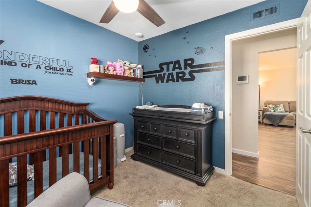 27432 Pinavete Mission Viejo, CA 92691 - Photo 29 of 37 a bedroom with furniture and a baby crib