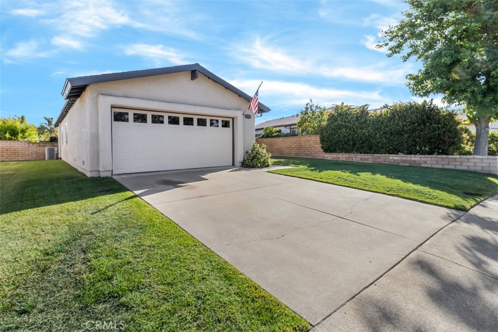 27432 Pinavete Mission Viejo, CA 92691 - Photo 3 of 37 a front view of a house with a yard and garage