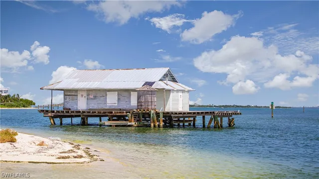 a view of a house with roof deck