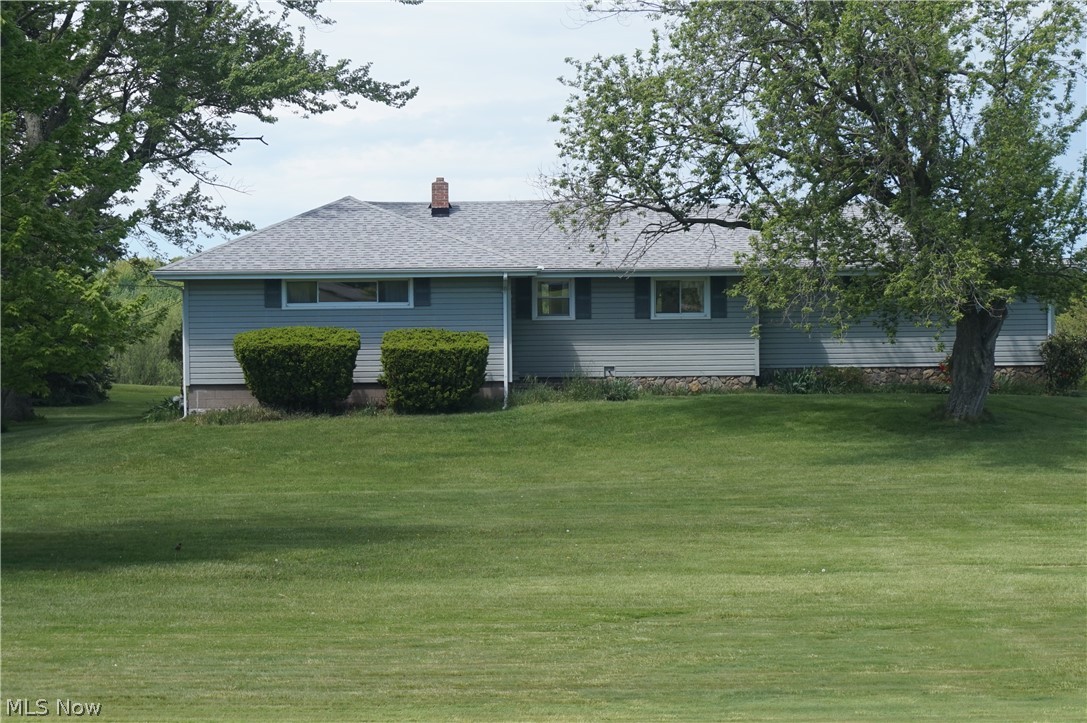 2465 South Ridge Road East Ashtabula, OH 44004 - Photo 36 of 38 Rear view of property with a lawn
