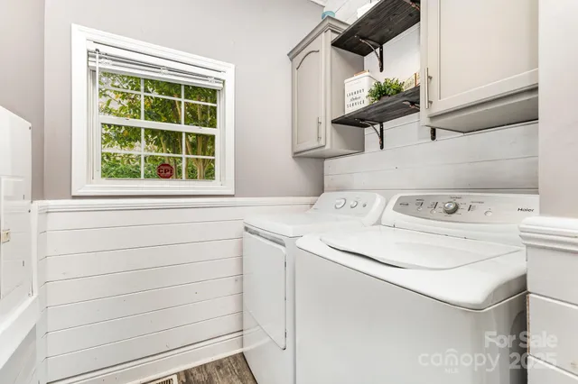 a utility room with dryer and washer