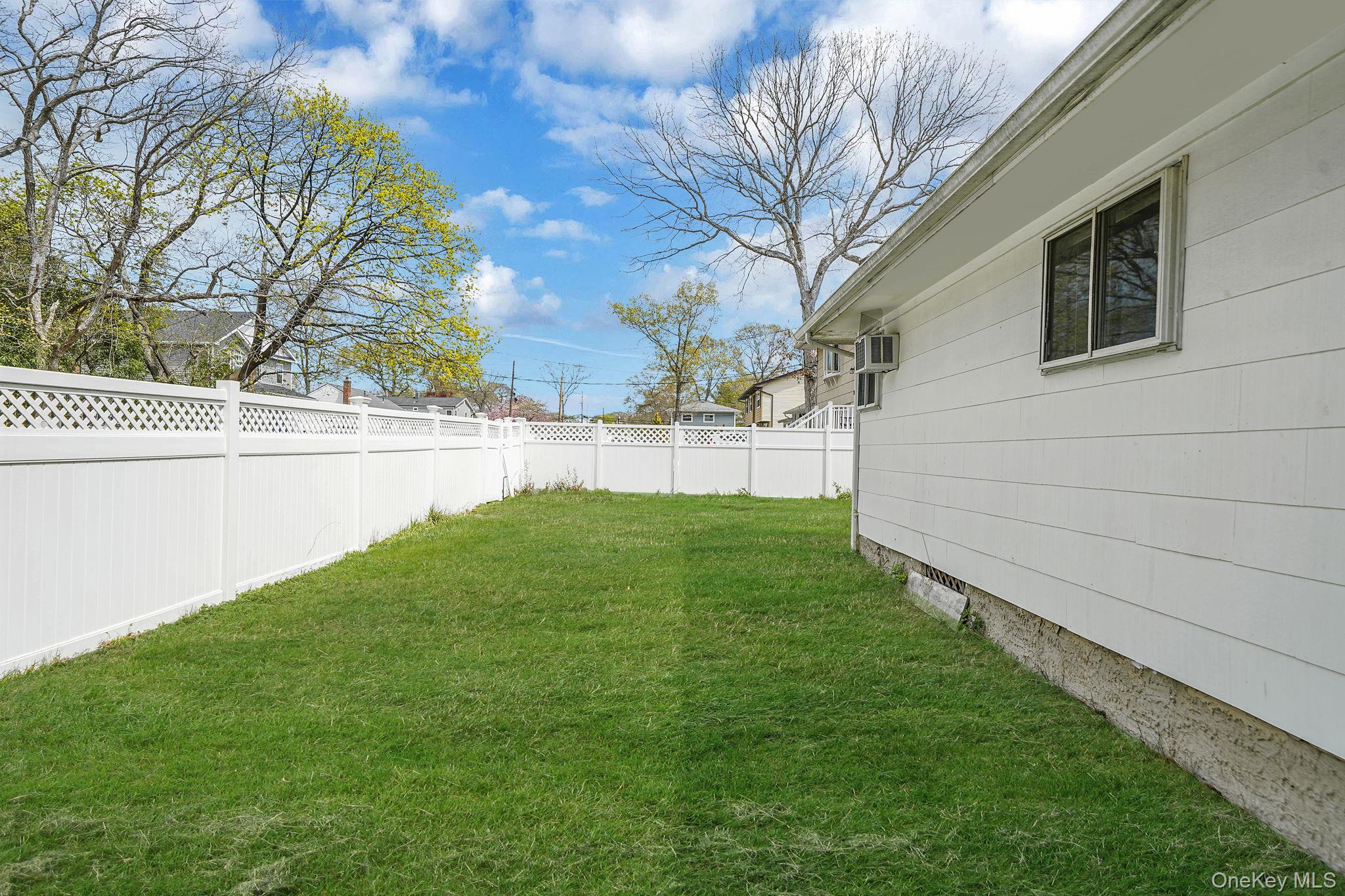 2771 Pond Road Ronkonkoma, NY 11779 - Photo 19 of 22 Fenced yard