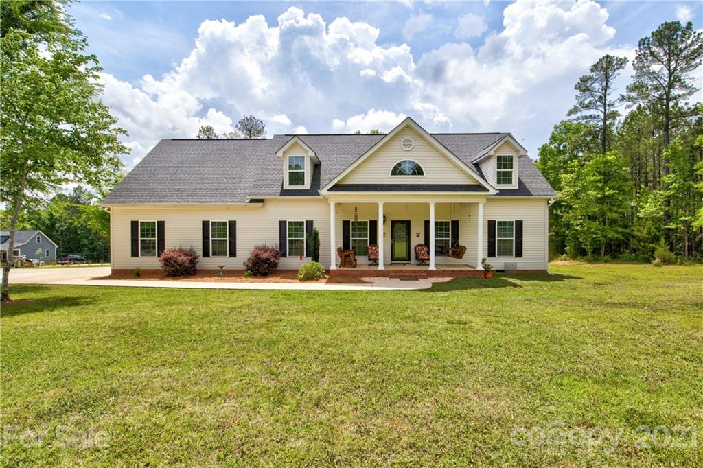 1637 State Rd S-46-1102, Unit 4 York, SC 29745 - Photo 1 of 39 a front view of a house with swimming pool having outdoor seating