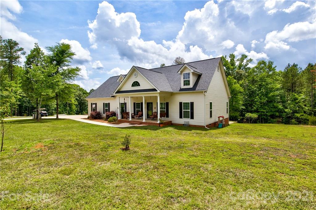 1637 State Rd S-46-1102, Unit 4 York, SC 29745 - Photo 2 of 39 a front view of a house with garden