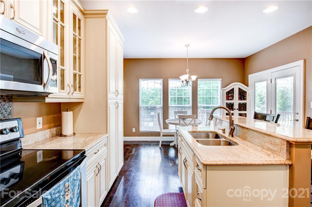 1637 State Rd S-46-1102, Unit 4 York, SC 29745 - Photo 15 of 39 a kitchen that has a sink and a stove in it