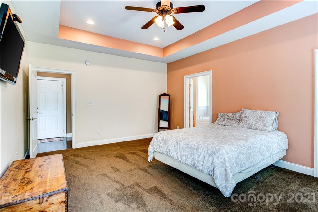 1637 State Rd S-46-1102, Unit 4 York, SC 29745 - Photo 18 of 39 a bedroom with a bed and a flat screen tv