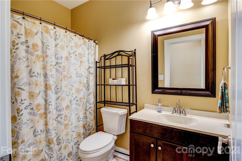 1637 State Rd S-46-1102, Unit 4 York, SC 29745 - Photo 24 of 39 a bathroom with a sink a toilet and shower