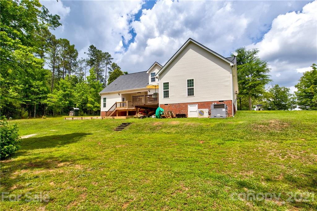 1637 State Rd S-46-1102, Unit 4 York, SC 29745 - Photo 31 of 39 a view of a house with a big yard and large trees