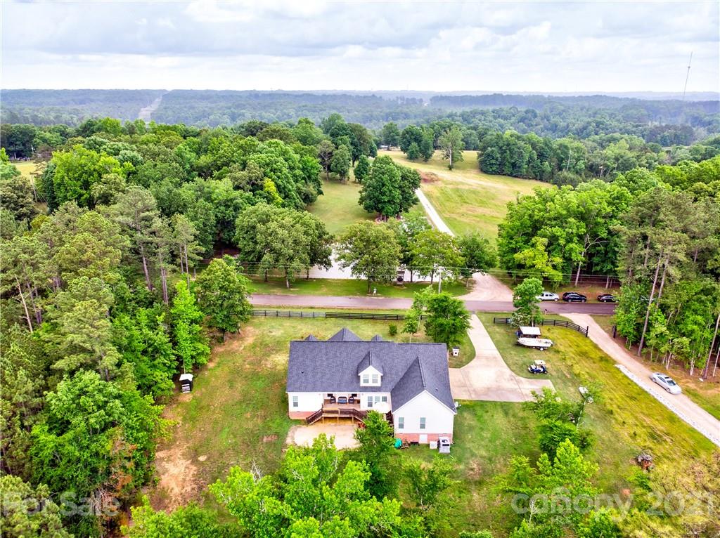 1637 State Rd S-46-1102, Unit 4 York, SC 29745 - Photo 38 of 39 an aerial view of a house with garden space and street view
