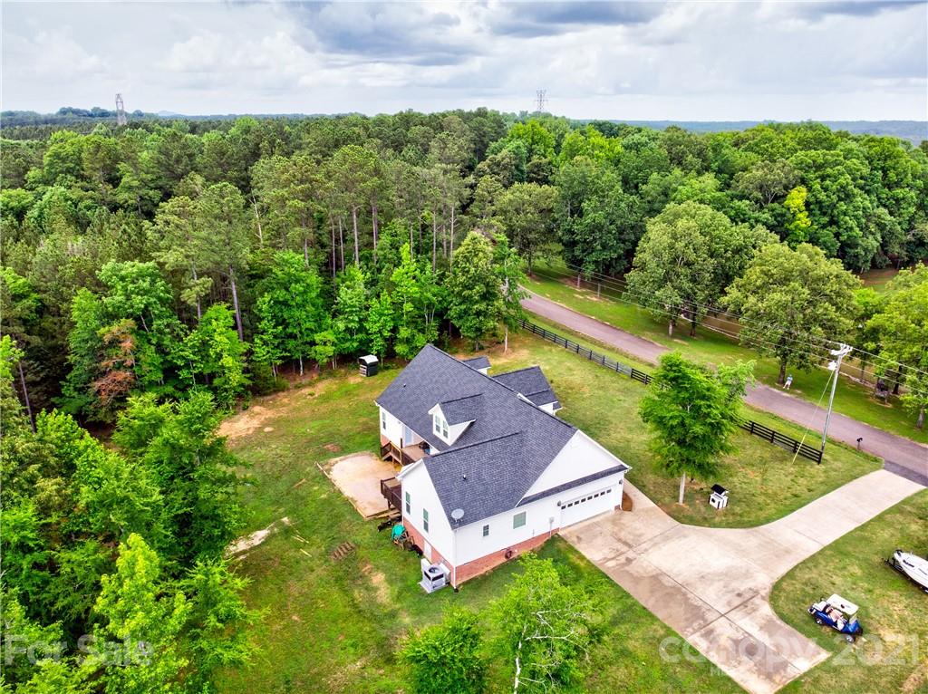 1637 State Rd S-46-1102, Unit 4 York, SC 29745 - Photo 39 of 39 an aerial view of a house with a garden and yard