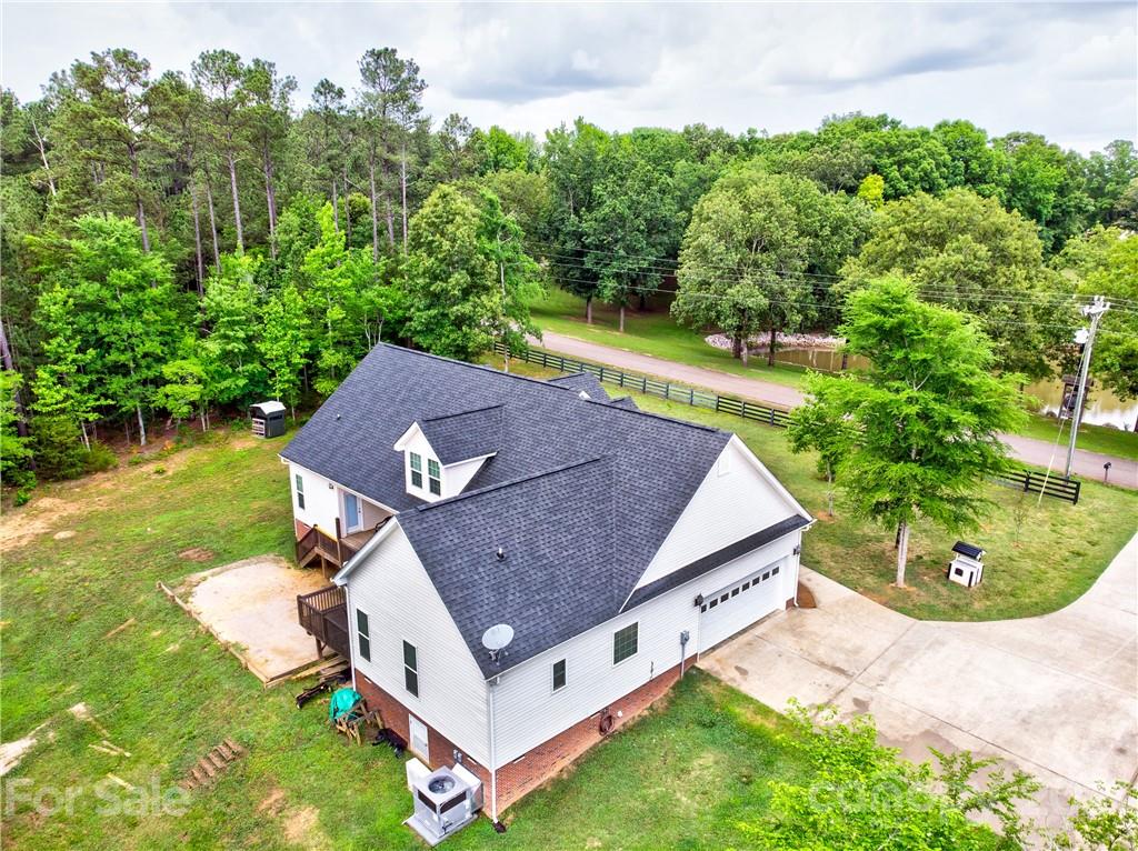 1637 State Rd S-46-1102, Unit 4 York, SC 29745 - Photo 7 of 39 an aerial view of a house with a yard