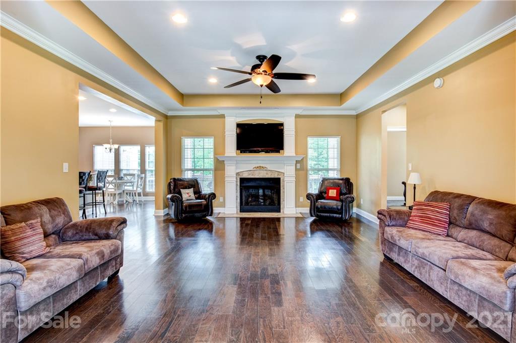 1637 State Rd S-46-1102, Unit 4 York, SC 29745 - Photo 8 of 39 a living room with furniture fireplace and a flat screen tv