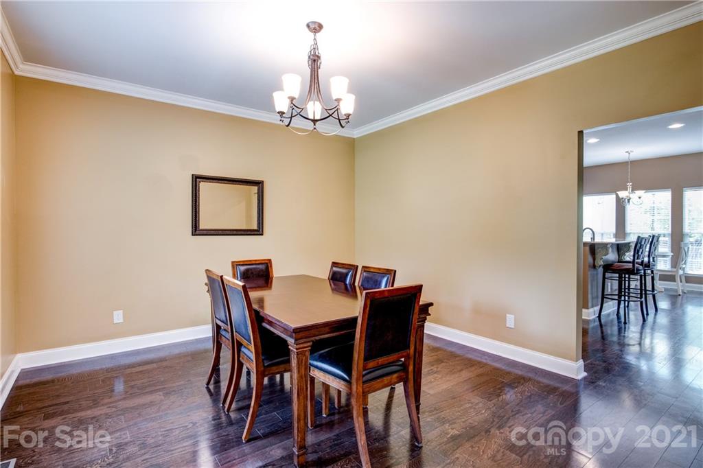 1637 State Rd S-46-1102, Unit 4 York, SC 29745 - Photo 10 of 39 a view of a dining room with furniture and wooden floor