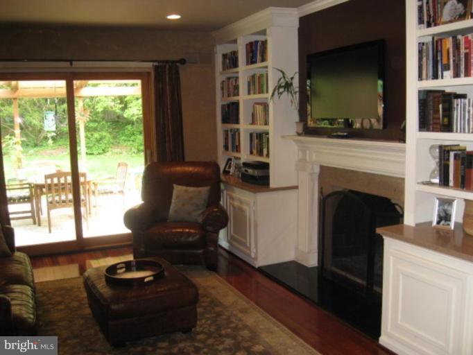 8609 Atwell Road Potomac, MD 20854 - Photo 6 of 22 Family Room over looking back yard, fireplace