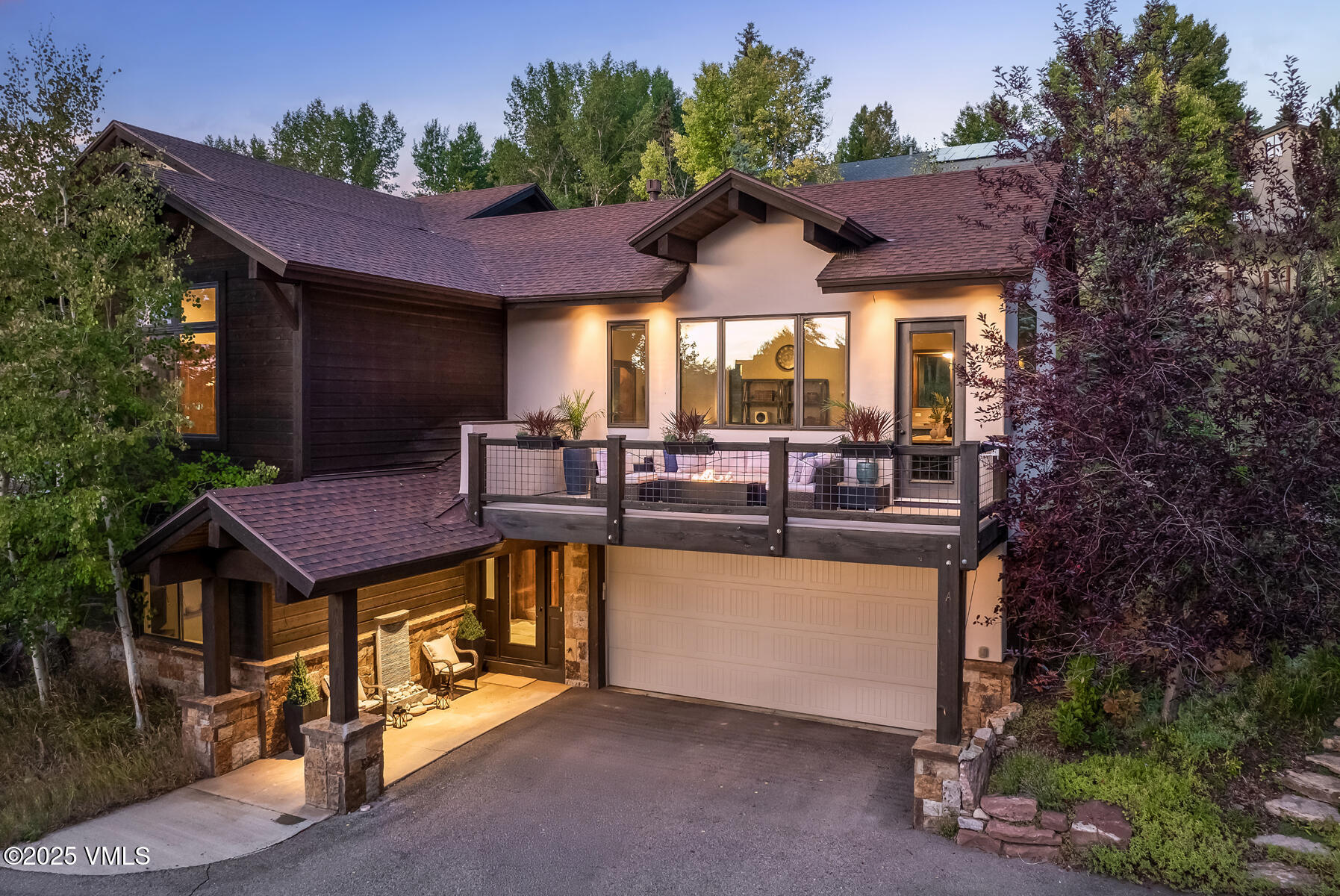 a small pool with table and chairs