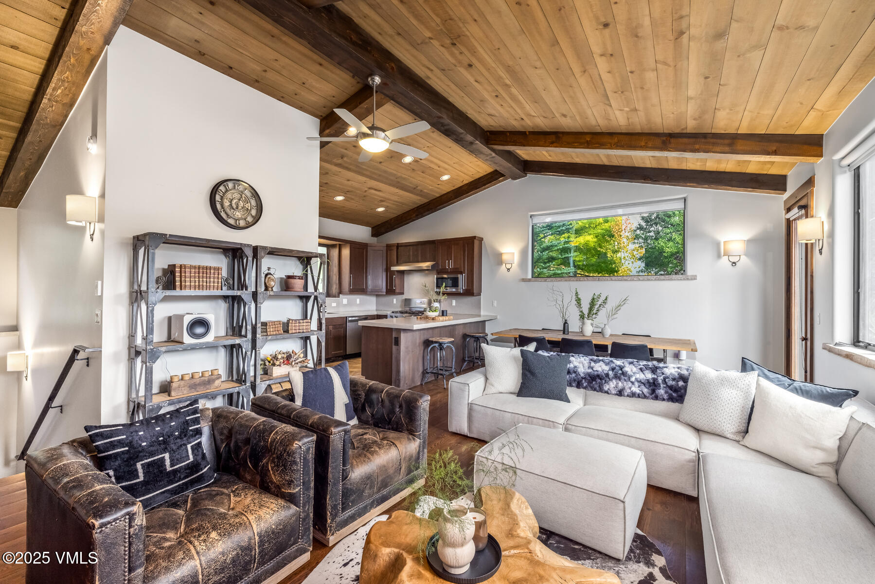 2310 Old Trail Road, Unit A Avon, CO 81620 - Photo 6 of 36 a living room with furniture and a flat screen tv