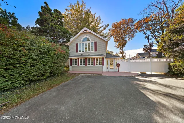 a view of a house with a street