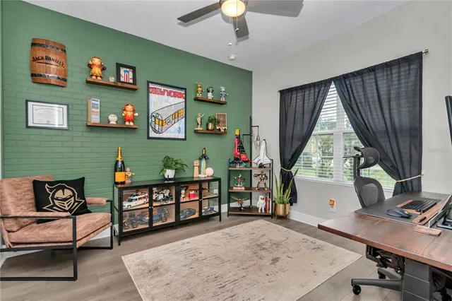 a view of a house with a yard and porch