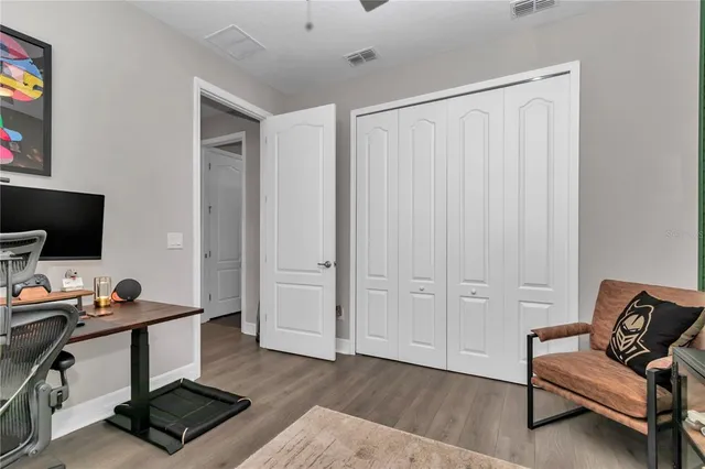 an aerial view of a house with pool