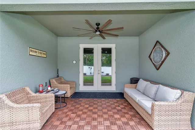 an aerial view of residential house with outdoor space and swimming pool