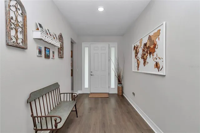 a kitchen with stainless steel appliances granite countertop a stove and a refrigerator