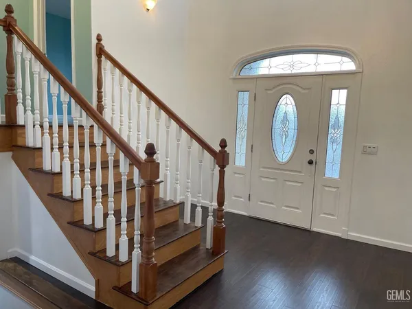 a view of entryway with wooden floor