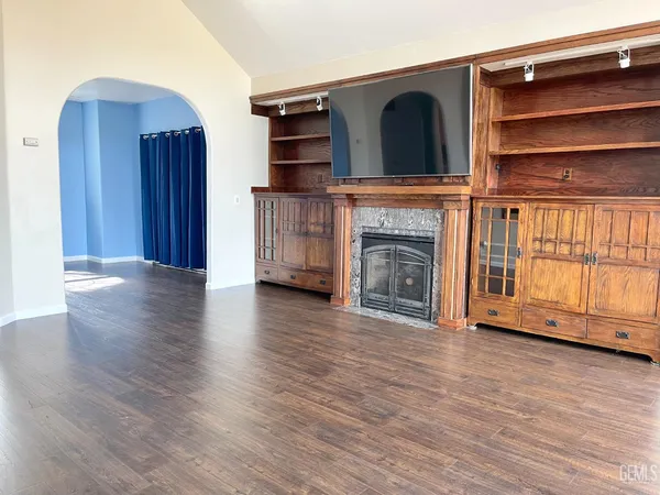 a view of a livingroom with wooden floor