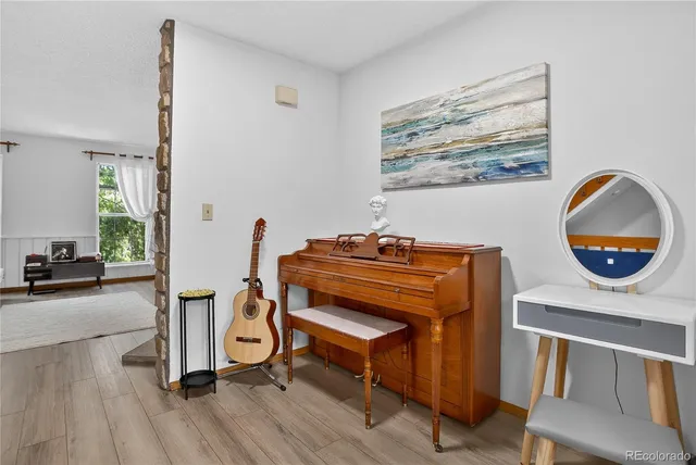 a room with furniture and a mirror