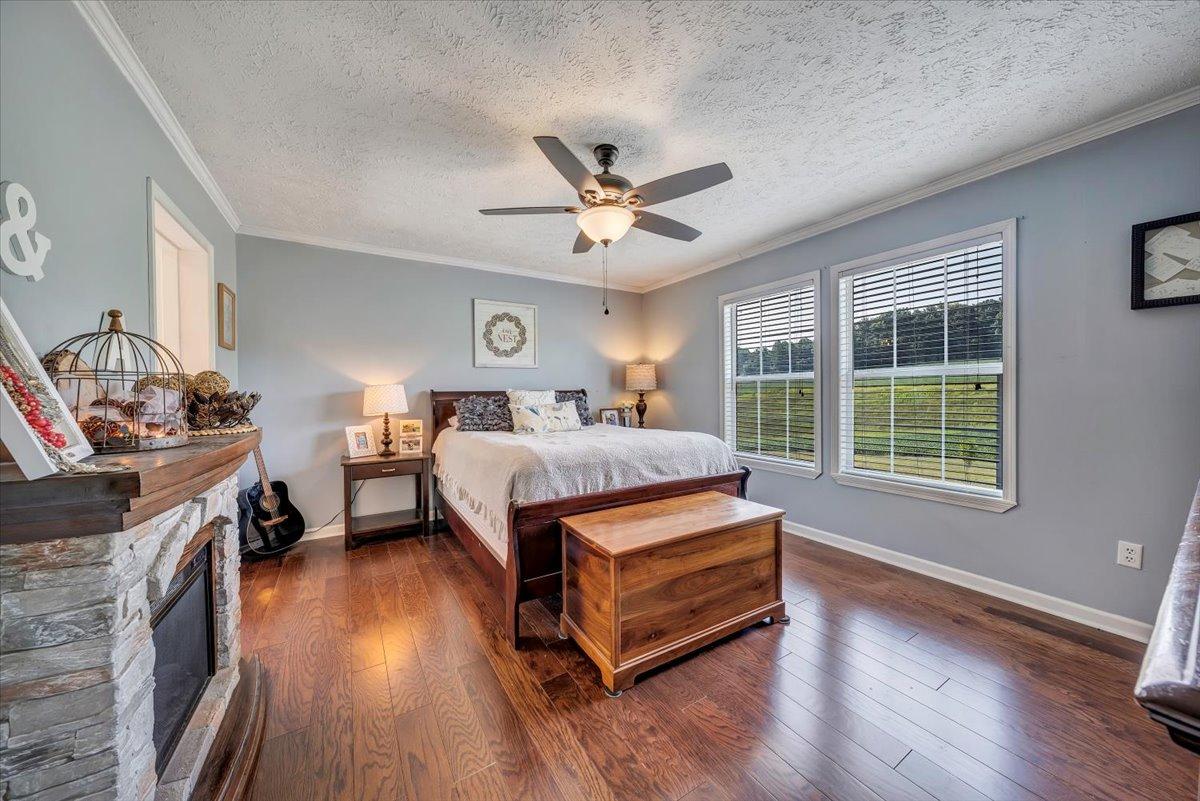 988 Timber Line Road Ferrum, VA 24088 - Photo 15 of 34 a bedroom with a bed dresser and a window