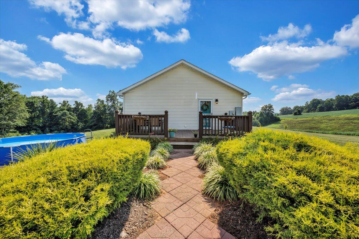 988 Timber Line Road Ferrum, VA 24088 - Photo 20 of 34 a view of swimming pool with a garden