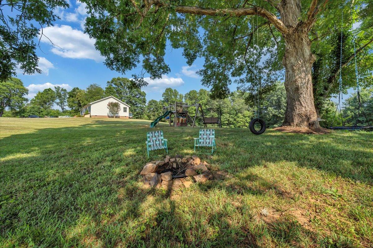 988 Timber Line Road Ferrum, VA 24088 - Photo 26 of 34 a view of a garden with an trees