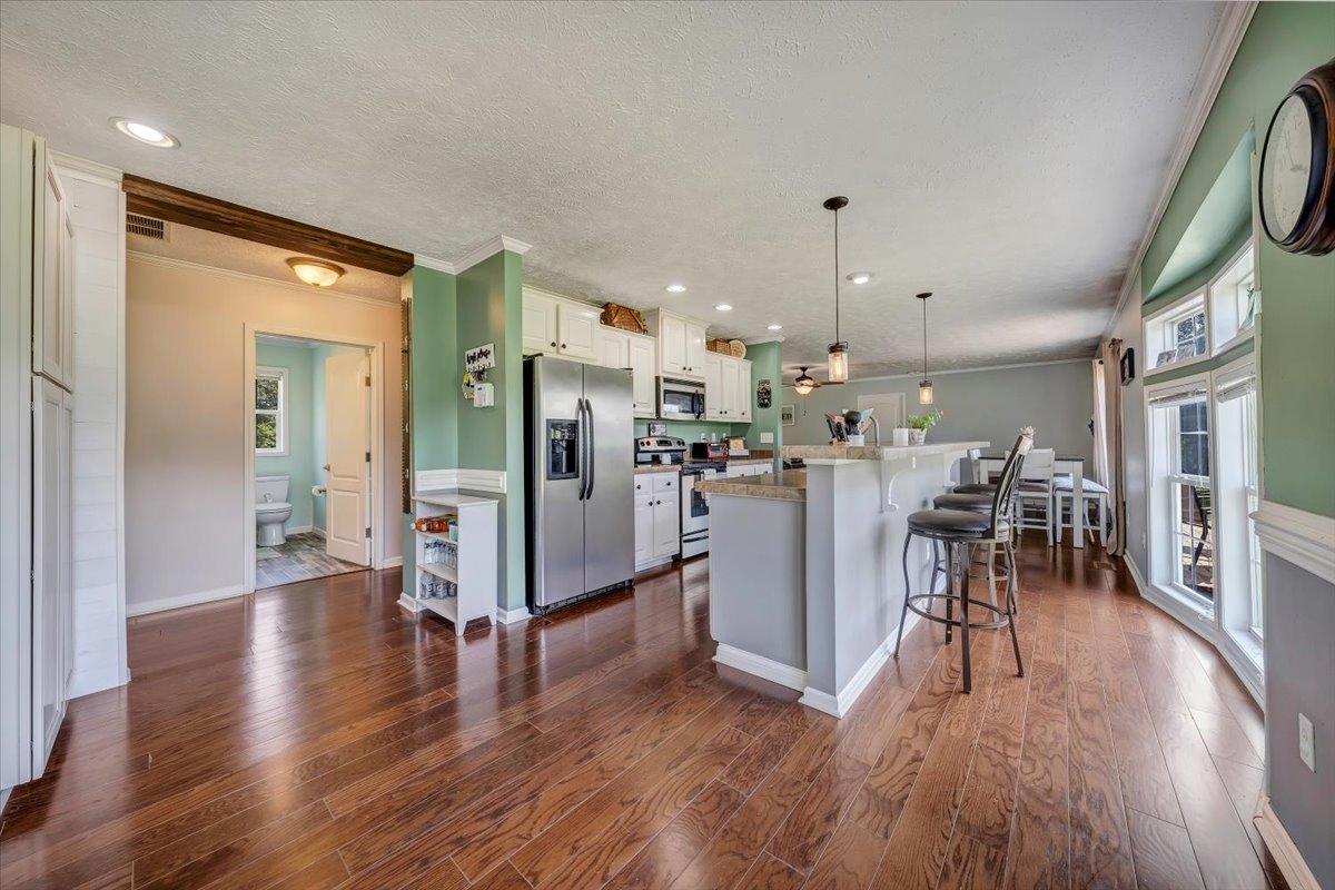 988 Timber Line Road Ferrum, VA 24088 - Photo 8 of 34 a view of a kitchen and dining room
