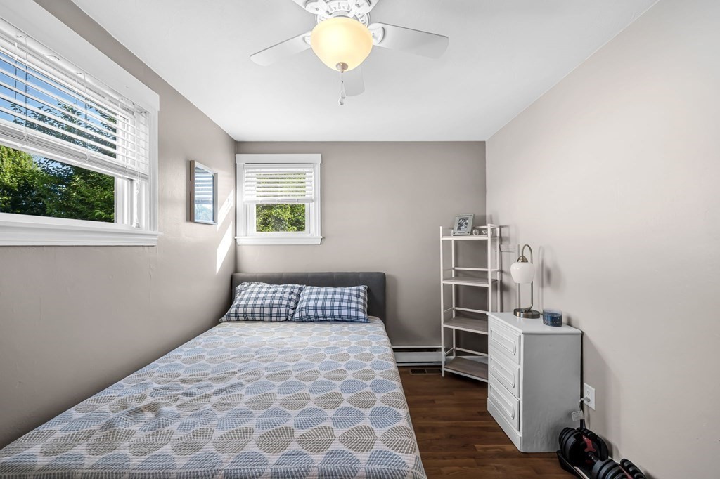 39 Rita Street Springfield, MA 01118 - Photo 23 of 42 a bedroom with a bed and a window