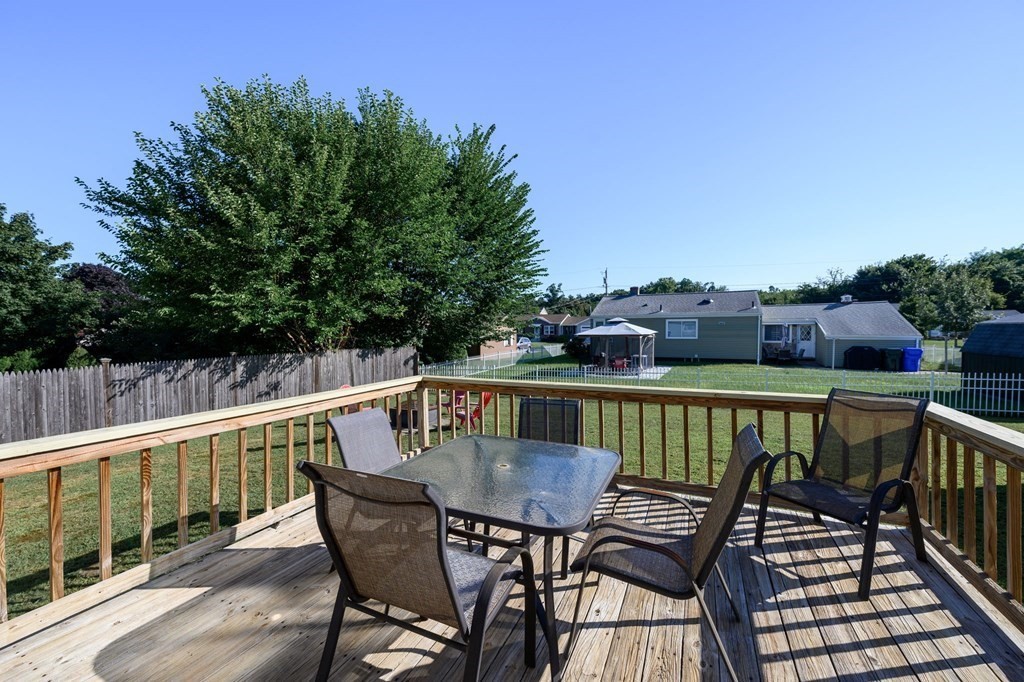 39 Rita Street Springfield, MA 01118 - Photo 35 of 42 a view of balcony with furniture and trees