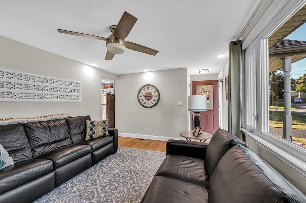 39 Rita Street Springfield, MA 01118 - Photo 6 of 42 a living room with furniture and a large window
