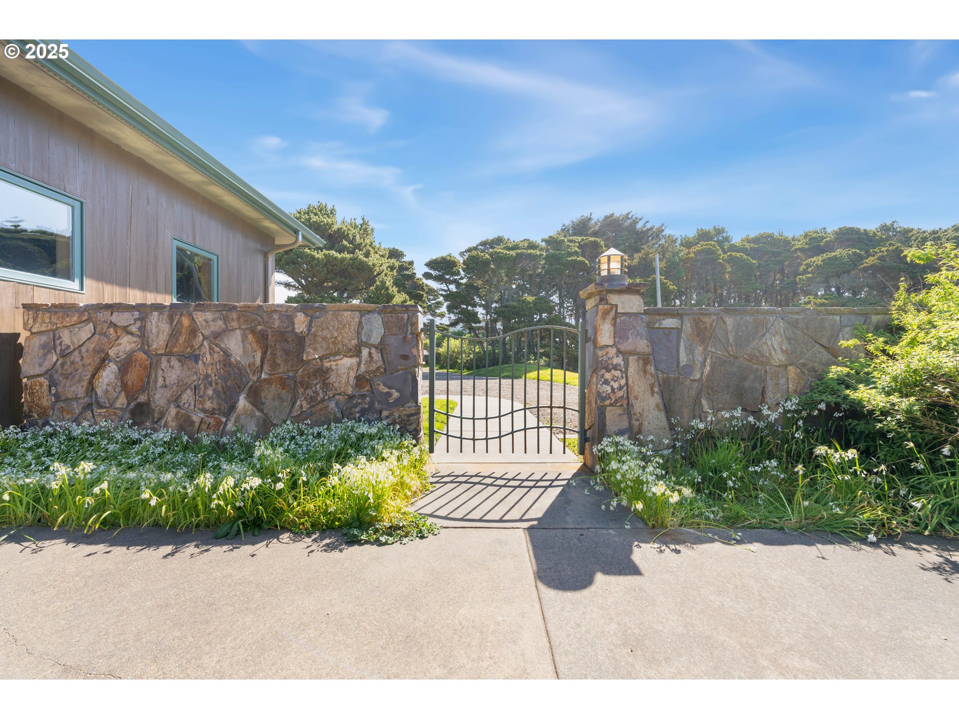 1950 Beach Loop Road Bandon, OR 97411 - Photo 13 of 45 a view of a garden with pathway