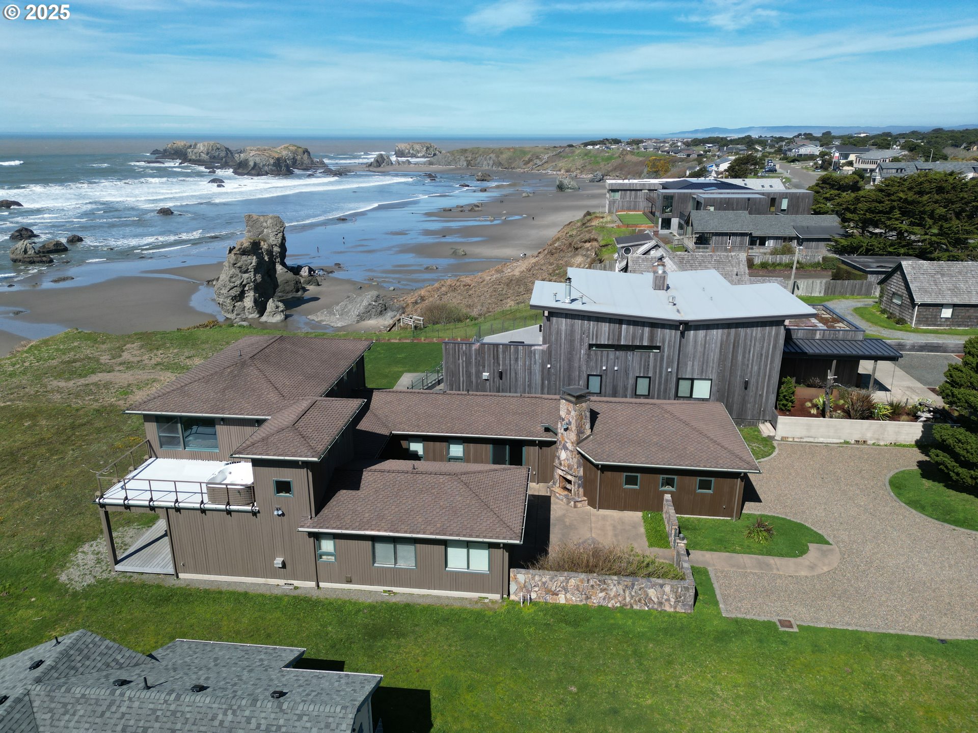 1950 Beach Loop Road Bandon, OR 97411 - Photo 2 of 45 an aerial view of a house with garden space and ocean view