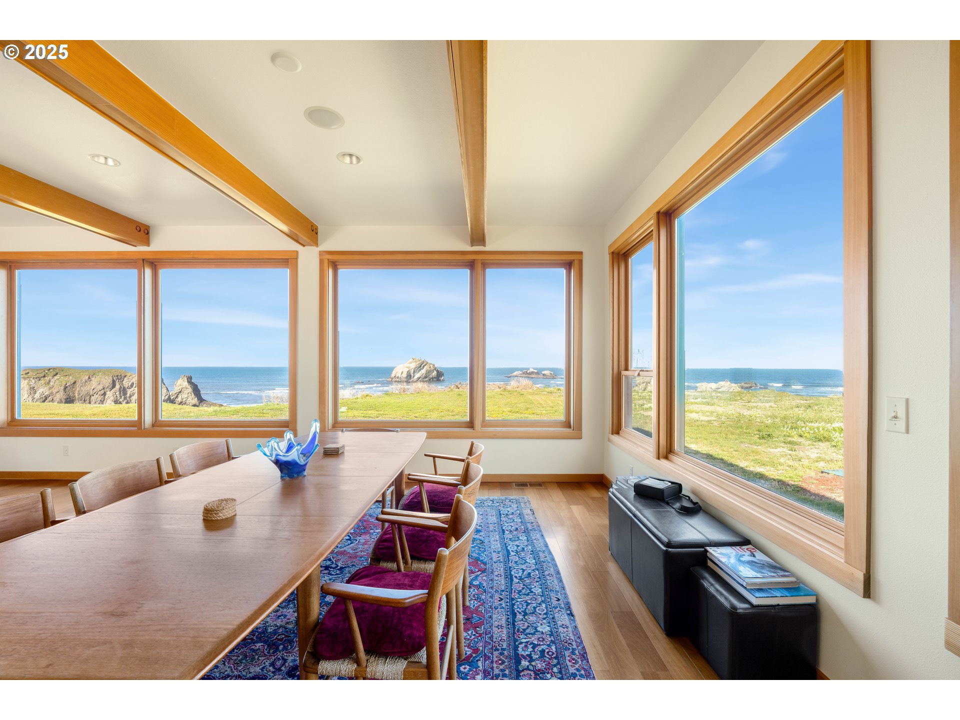 1950 Beach Loop Road Bandon, OR 97411 - Photo 24 of 45 a living room with furniture and floor to ceiling windows