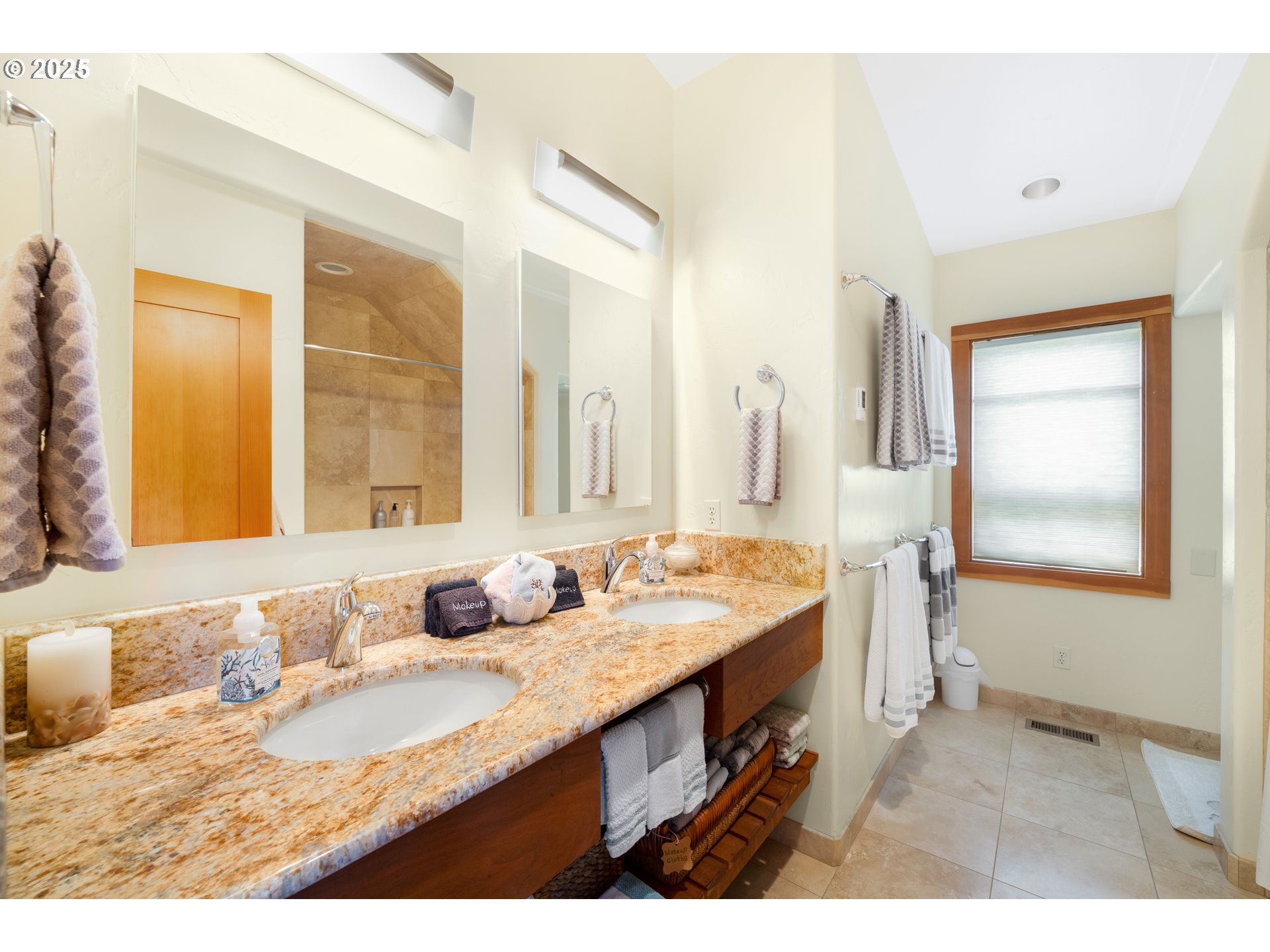 1950 Beach Loop Road Bandon, OR 97411 - Photo 34 of 45 a bathroom with a granite countertop sink and a mirror